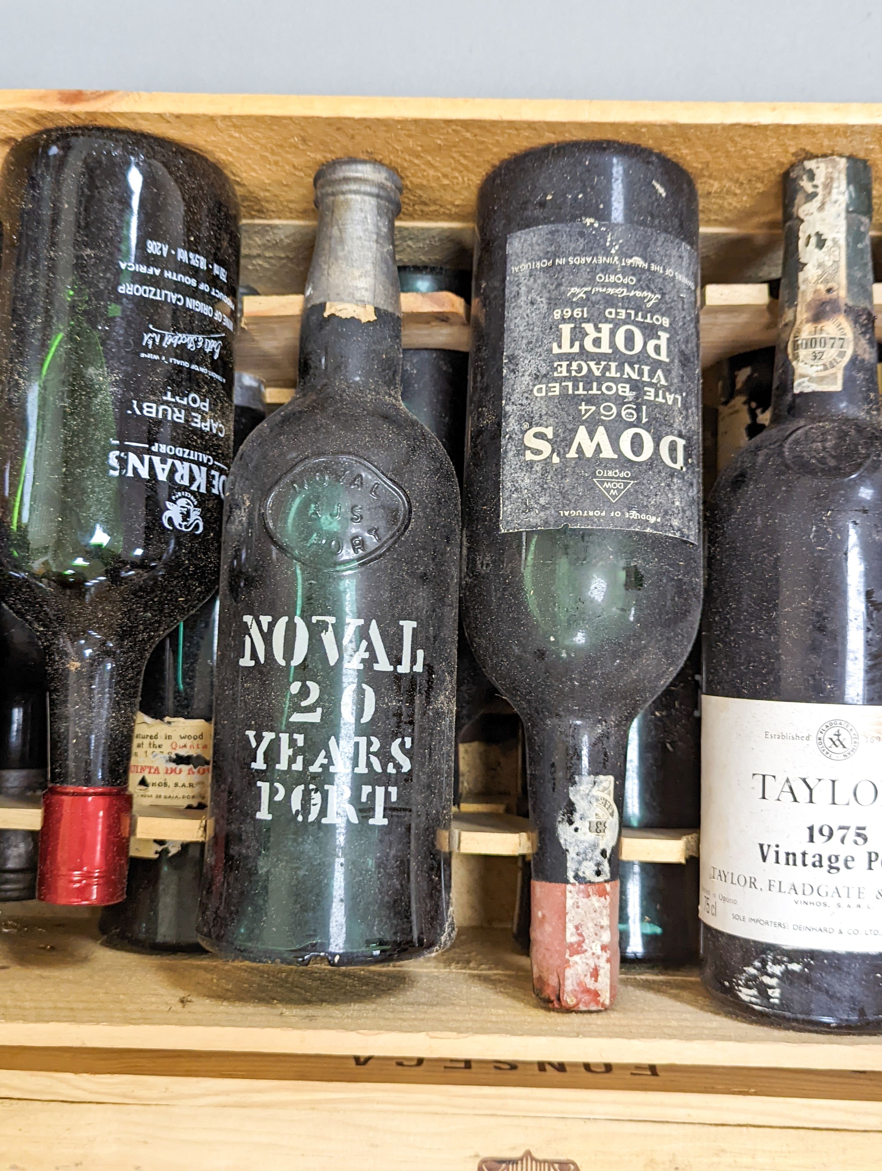13 various bottles of port including Taylor’s 1975 vintage, Dow’s 1964, Noval etc.